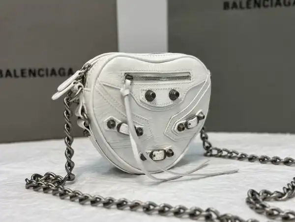 First bag ru BALENCIAGA  Le Cagole Heart mini metallic crinkled-leather shoulder bag 0124