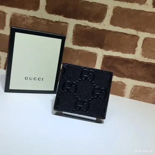 First bag ru GG embossed wallet GUCCI 0217